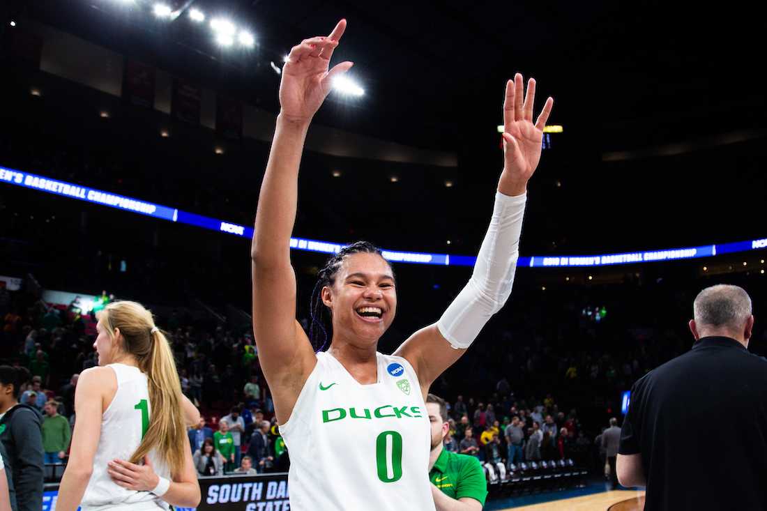 <p>Ducks forward Satou Sabally (0) celebrates after the game. Oregon Ducks women’s basketball takes on South Dakota State University at the Moda Center in Portland, Ore. on March 29, 2019. (Sarah Northrop/Emerald)</p>