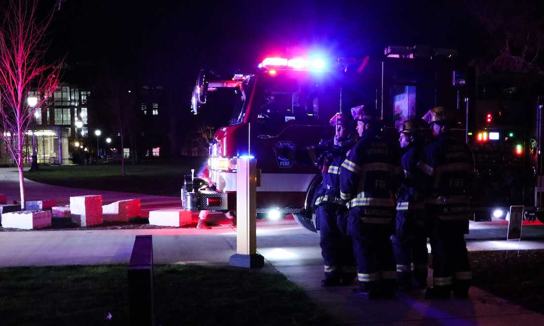 Firefighters respond to a structure fire in Earl Hall Monday night. (Melodie Moore/Emerald)