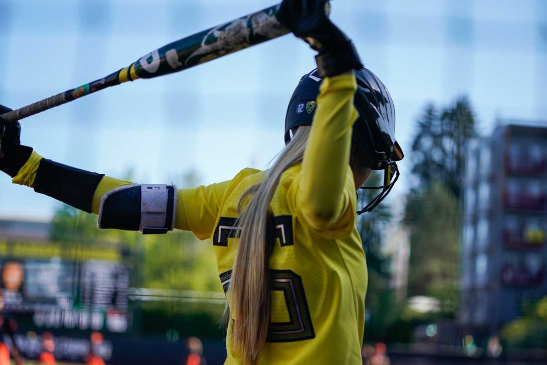 <p>Haley Cruse (26) stretches before her first at bat of the game. Oregon Ducks softball takes on Oregon State University at Jane Sanders Stadium in Eugene, Ore. on April 26, 2019. (Ben Green/Emerald)</p>