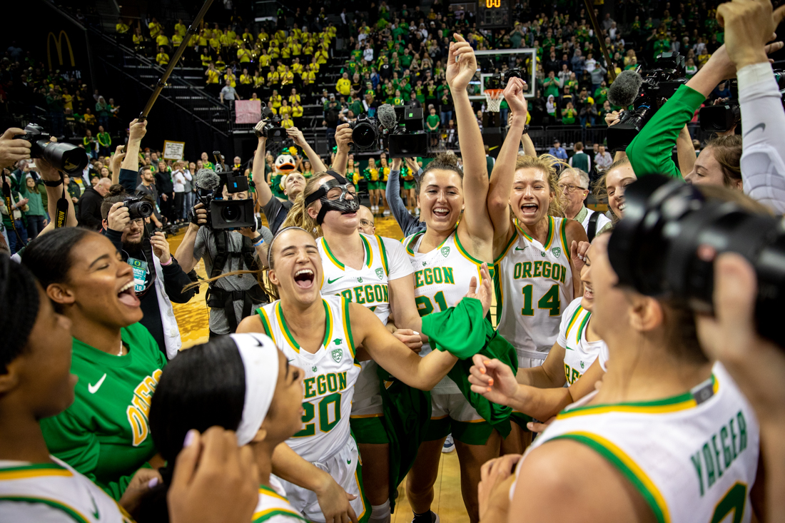 Oregon Ducks celebrate their win. Oregon Ducks women&#8217;s basketball takes on University of Washington at the Matthew Knight Arena in Eugene, Ore. on Mar 1, 2020. (Maddie Knight/Emerald)