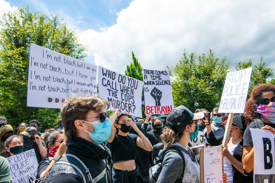 <p>Protesters gather at a Black Lives Matter protest taking place at the Eugene Courthouse in response to police brutality and the killing of Black individuals. A Black Lives Matter protest takes place in Eugene, Ore. on May 31, 2020. (Kimberly Harris/Emerald)</p>