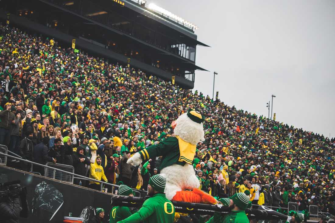 The oregon duck points to the crowd after the Ducks score the first points of the game. Oregon Ducks football takes on Oregon State for the Civil War game at Autzen Stadium in Eugene, Ore. on Nov. 30, 2019. (DL Young/Emerald)