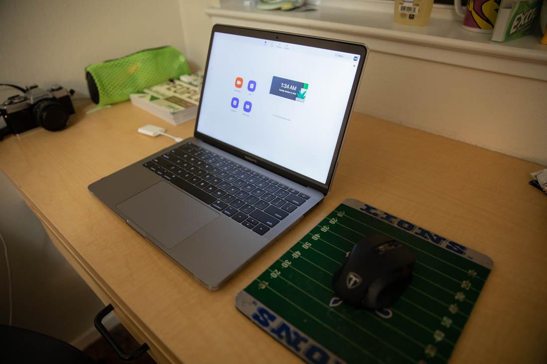 A laptop sits open waiting to join a university zoom call. (Maddie Stellingwerf/Emerald)