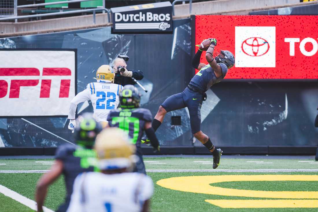 Ducks wide receiver Devon Williams (2) grabs a touchdown pass. Oregon Ducks football takes on the UCLA Bruins at Autzen Stadium in Eugene, Ore., on Nov. 21, 2020. (DL Young/Emerald)