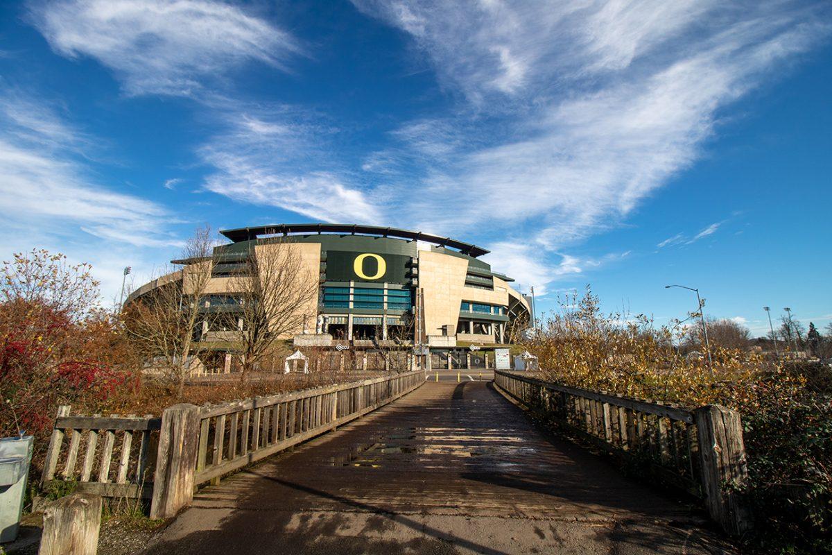 <p>A small footbridge serves as the final crossing point before arriving at Autzen Staduim. The pathway students used to walk to Autzen stadium during previous football seasons is eerily empty due to the circumstances surrounding the COVID-19 pandemic. (Will Geschke/Emerald)</p>