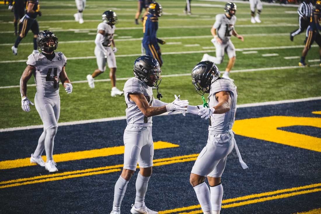 Ducks wide receiver Johnny Johnson III (3) celebrates his touchdown. Oregon Ducks football takes on the California Golden Bears at California Memorial Stadium in Berkeley, Calif., on Dec. 5, 2020. (DL Young/Emerald)