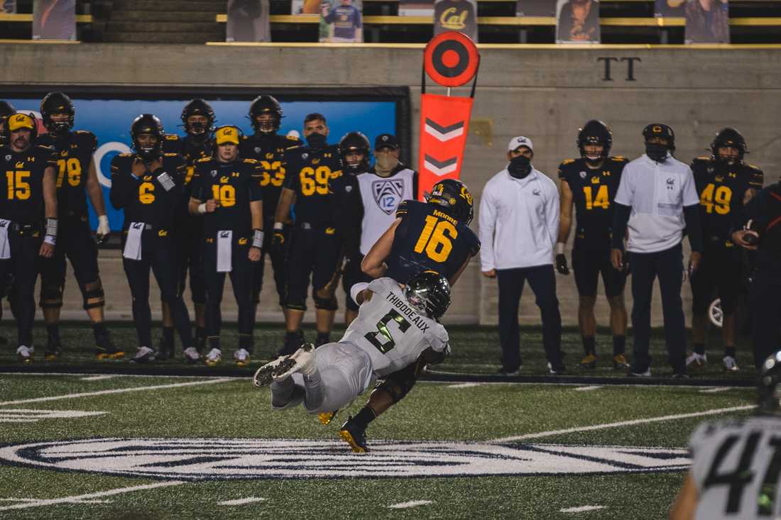 <p>Ducks defensive end Kayvon Thibbodeaux (5) dives for a tackle. Oregon Ducks football takes on the California Golden Bears at California Memorial Stadium in Berkeley, Calif., on Dec. 5, 2020. (DL Young/Emerald)</p>