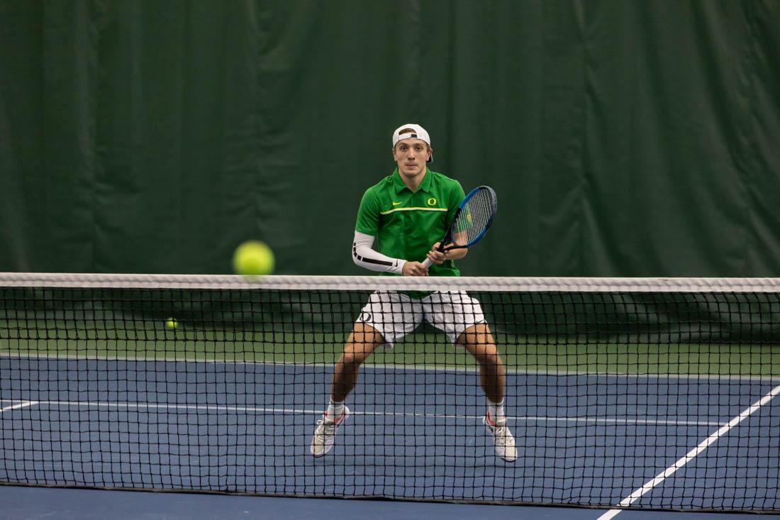 Ducks sophomore Jesper Kl&#246;v-Nilsson prepares for the incoming serve. Oregon Ducks men's tennis take on Portland State Vikings at the Student Tennis Center on Feb. 06, 2021. (Maddie Stellingwerf/Emerald)