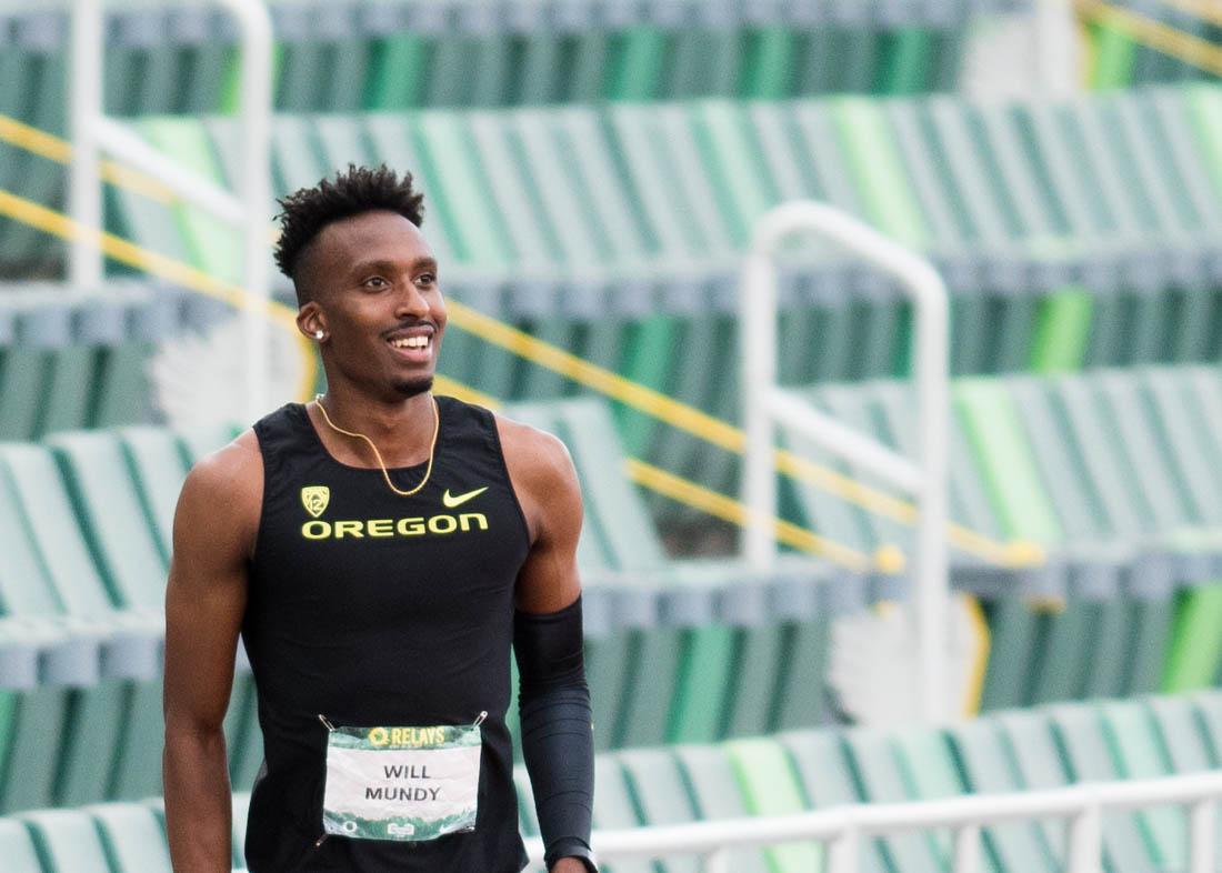 Will Mundy takes a moment to celebrate his win. Will Mundy takes first place for the Ducks in the Men&#8217;s 400 meter Hurdles. The Oregon Ducks host the Oregon Relays for track and field at the newly renovated Hayward Field in Eugene, Ore., April 23, 2021. (Madi Mather/Emerald)