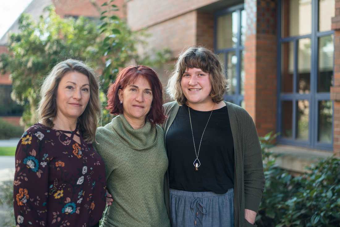 Christina Turchetto (left), Lara Fernandez (center) and Megan Faulkner (right) are members of the Summer Academy to Inspire Learning (SAIL) staff. University of Oregon students can volunteer for SAIL programs, which provide high school students with information about pursuing a higher education. (Marissa Willke/Emerald)