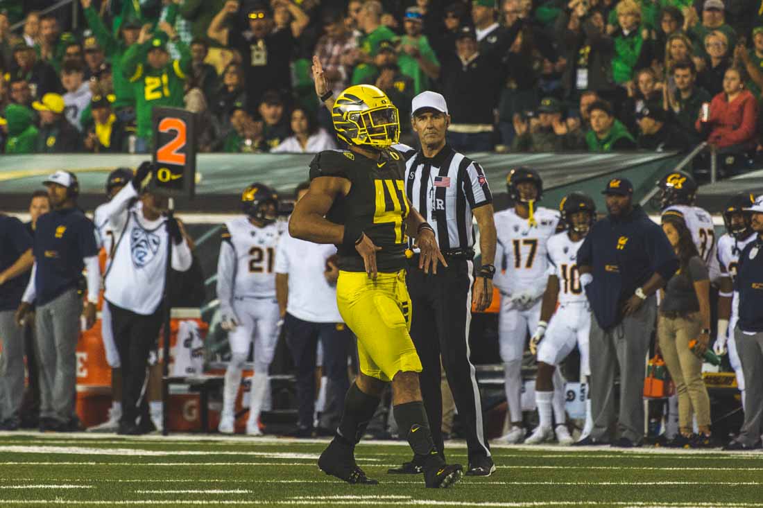 Ducks inside linebacker Isaac Slade-Matautia (41) celebbrates a sack in the fourth quarter. Oregon Ducks Football takes on University of California at Autzen Stadium in Eugene, Ore. on Oct. 5, 2019. (DL Young/Emerald)