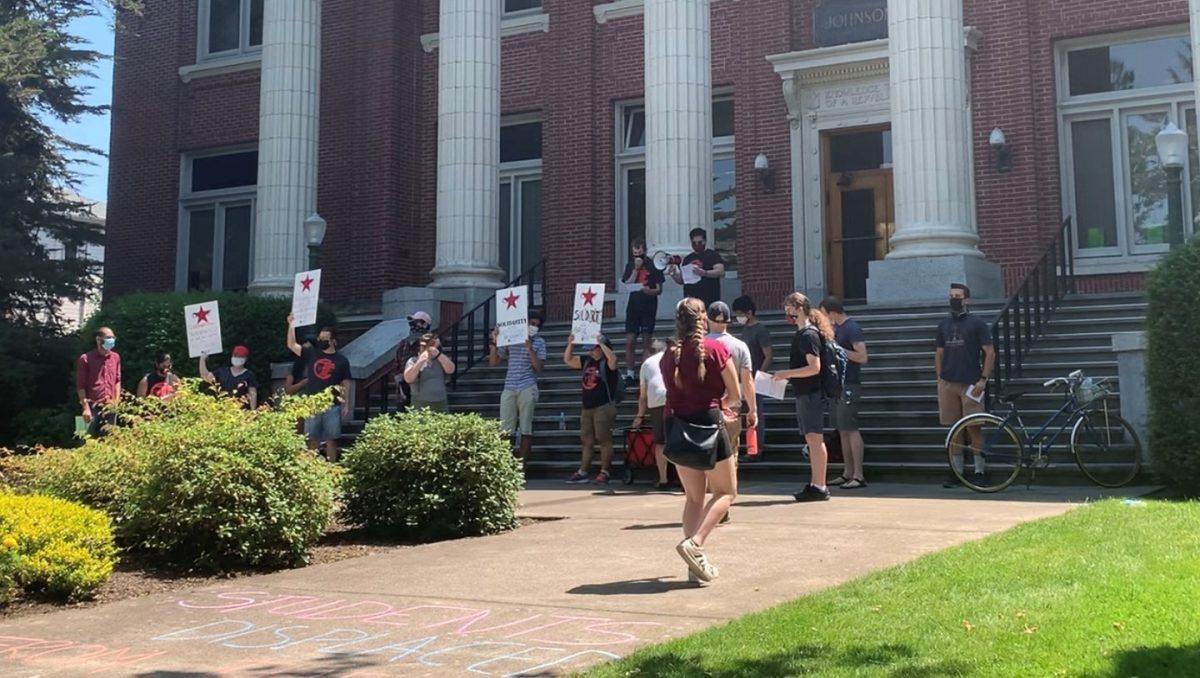 <p>Protesters gather outside Johnson Hall to oppose evictions in UO's Graduate Village. (Silas Sloan/Daily Emerald)</p>