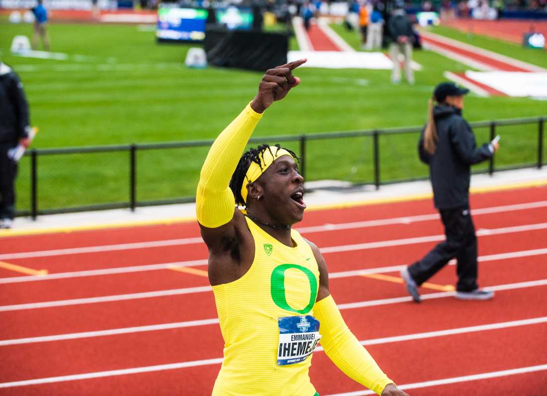 Oregon's Emmanuel Ihemeje takes a victory lap and celebrates after winning the men&#8217;s triple jump. Hayward Field hosts the third day of the 2021 NCAA Outdoor Track and Field Championships in Eugene, Ore., on June 11, 2021 (Ian Enger/Emerald).