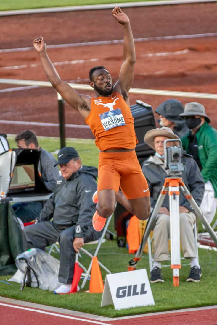 O'Brien Wasome from the University of Texas competes in the Men's Long Jump. Oregon Ducks host the 2021 NCAA Outdoor Track and Field Championships at Hayward Field in Eugene, Ore., on June 9, 2021. (Maddie Knight/Emerald)