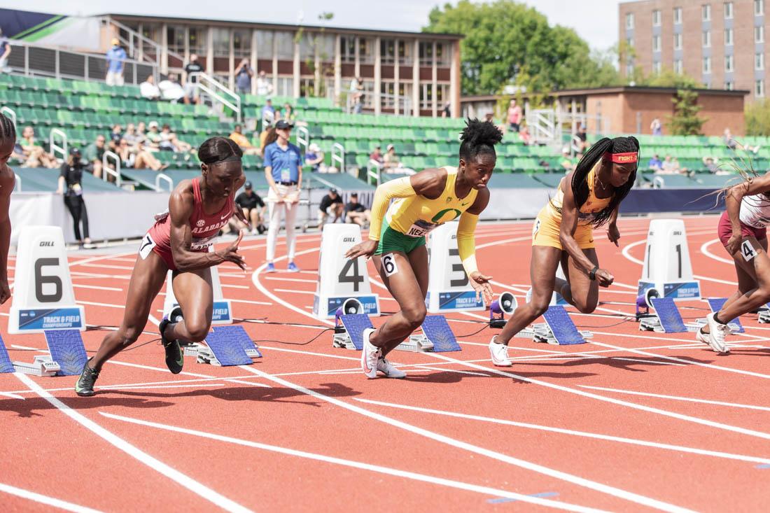 Runners begin the 100m dash. Hayward Field hosts the final day of the 2021 NCAA Track and Field Championships (Maddie Stellingwerf/Emerald)