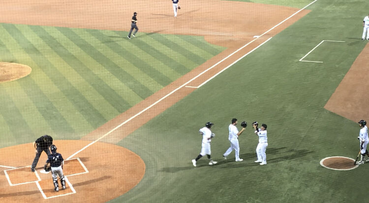 Tyler Fitzgerald celebrates after hitting a three-run homer for the Eugene Emeralds that secured his cycle on August 6.