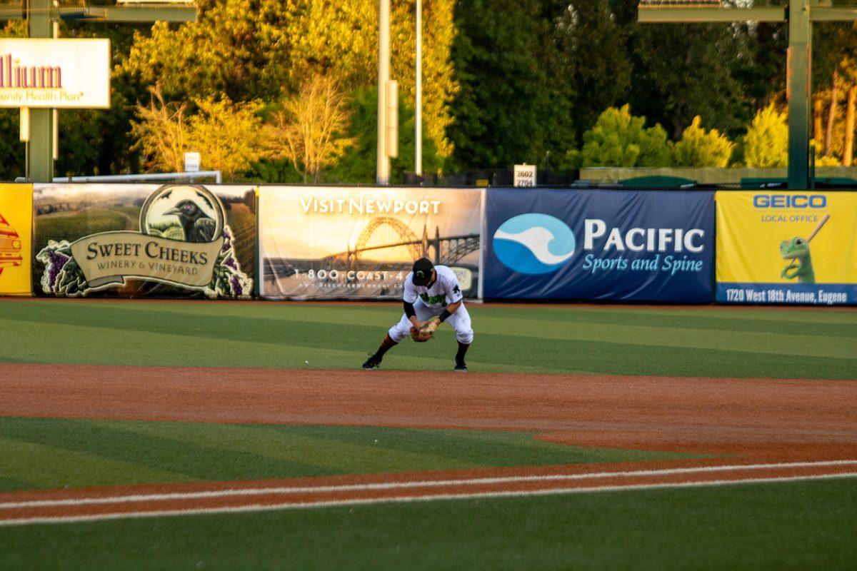 <p>Brett Auerbach (6) fields a ball and prepares to throw it to first base. The Eugene Emeralds suffered a major 10-2 defeat at the hands of the Everett AquaSox on Wednesday, July 7 at PK Park in Eugene, Oregon. (Will Geschke/Emerald)</p>