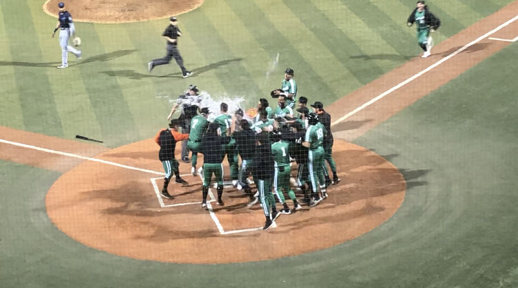 The Eugene Emeralds pour Gatorade on Sean Roby after his walk-off home run in an 8-7 win over the Everett AquaSox on August 20.