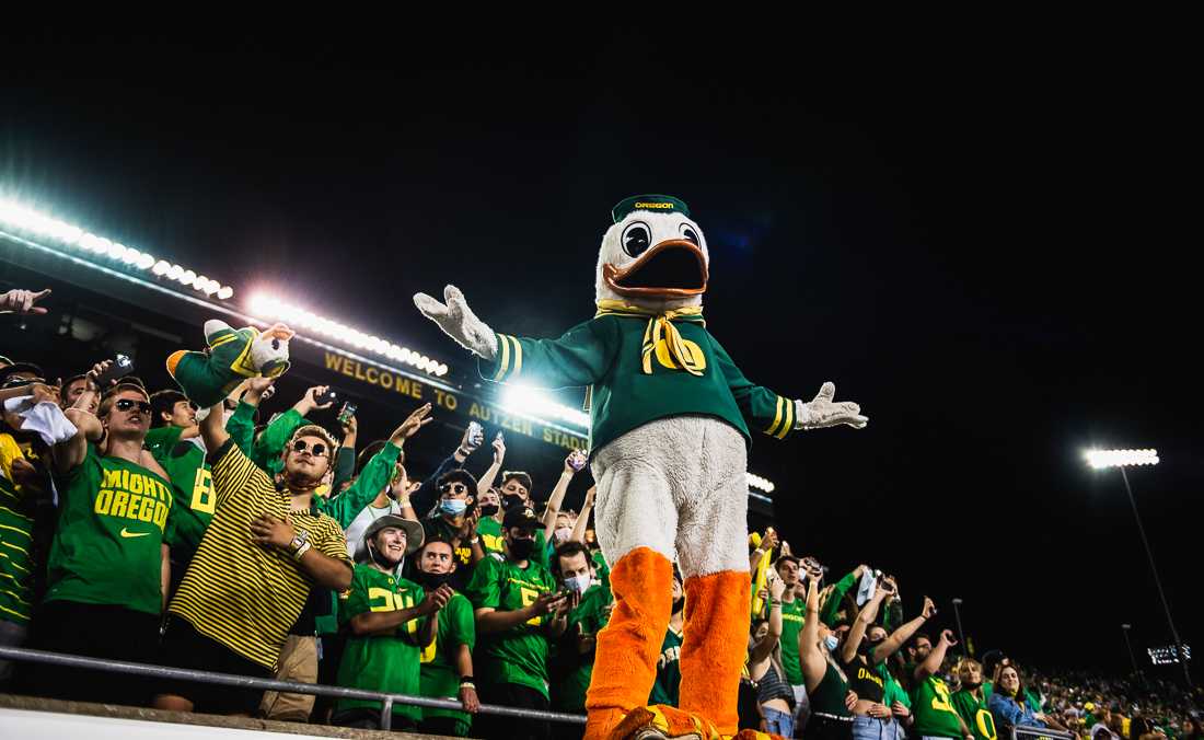 The Oregon Duck joins students to cheer on the Oregon Ducks football team. The Oregon Ducks crush the Arizona Wildcats 41-19 in game four of the 2021 season. (Ian Enger/ Emerald)