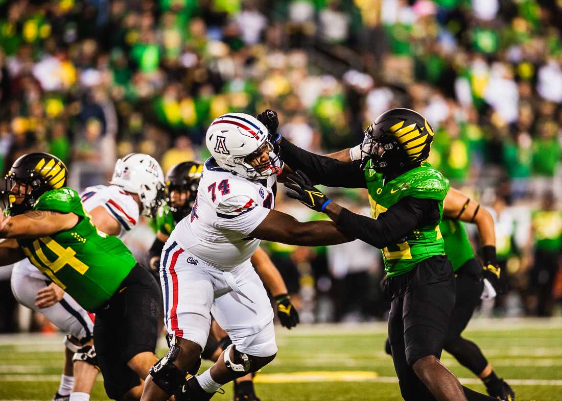 Oregon Ducks and Arizona Wildcats collide during Saturday night&#8217;s game at Autzen Stadium. The Oregon Ducks crush the Arizona Wildcats 41-19 in game four of the 2021 season. (Ian Enger/ Emerald)