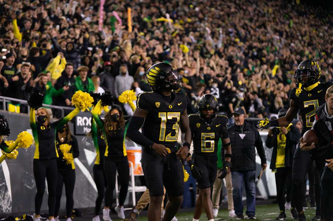 Anthony Brown (13) looks at the offense after holding the ball and making a running touchdown. The Oregon Ducks take on the California Golden Bears at Autzen Stadium in Eugene, Ore., on October 15, 2021. (Serei Hendrie/Emerald)