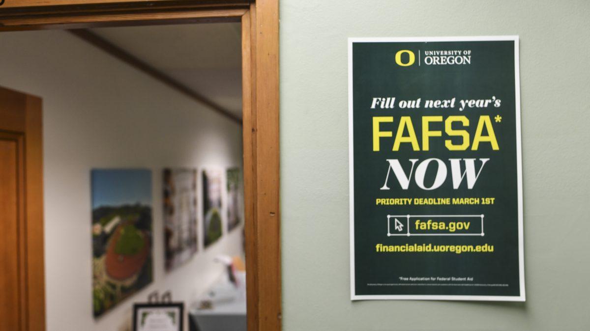 A FAFSA sign posted outside of the Office of Student Financial Aid and Scholarships on the University of Oregon campus in Eugene, Ore. on October 18, 2021. Many University of Oregon students use financial aid resources (Isaac Wasserman/ Daily Emerald)