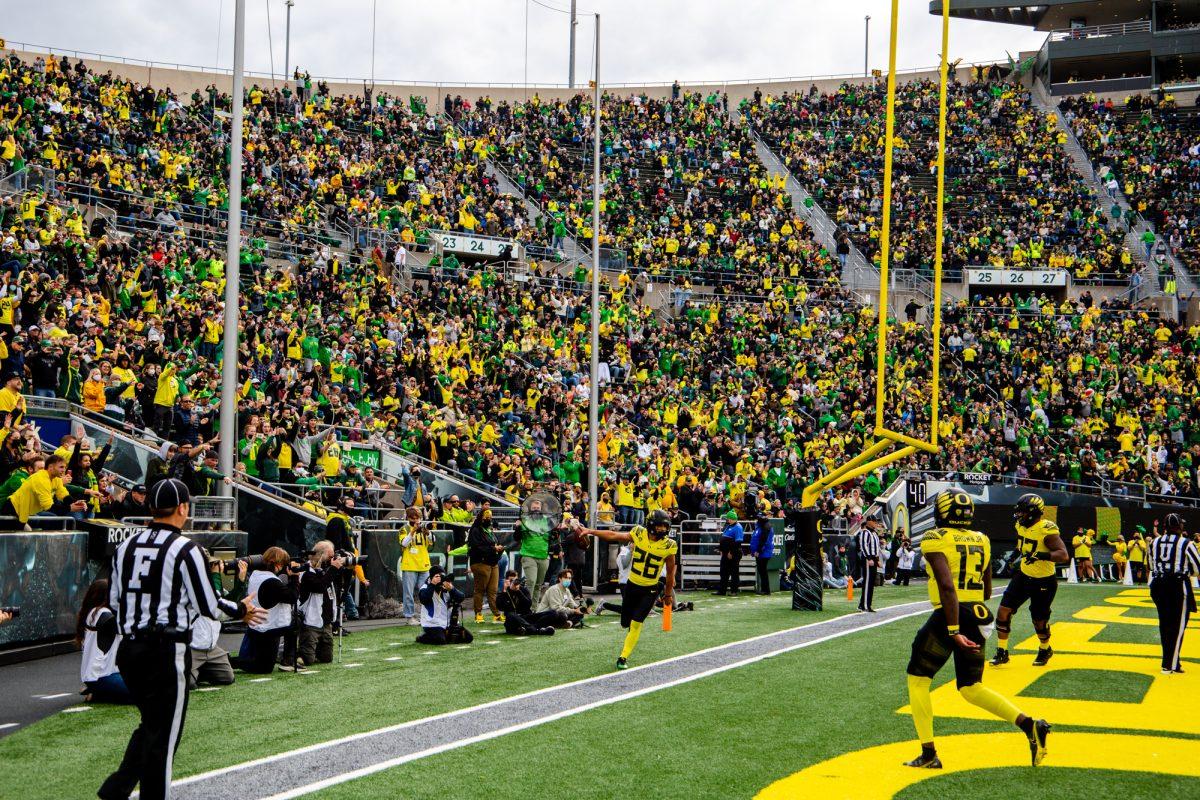 The crowd erupts after Travis Dye (26) runs in celebration after scoring a touchdown for Oregon. The University of Oregon Ducks defeated the University of Colorado Buffaloes 52-29 at Autzen Stadium on October 30, 2021. (Will Geschke/Emerald)