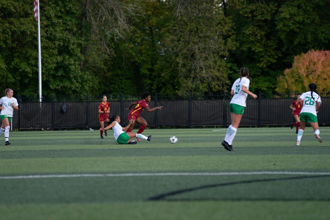 Ducks Defender, Chai Cortez (6) goes for a slide tackle. Oregon Ducks Soccer take on the University of Southern California Trojans at Pape Field in Eugene, Ore., on October 14, 2021. (Serei Hendrie/Emerald)