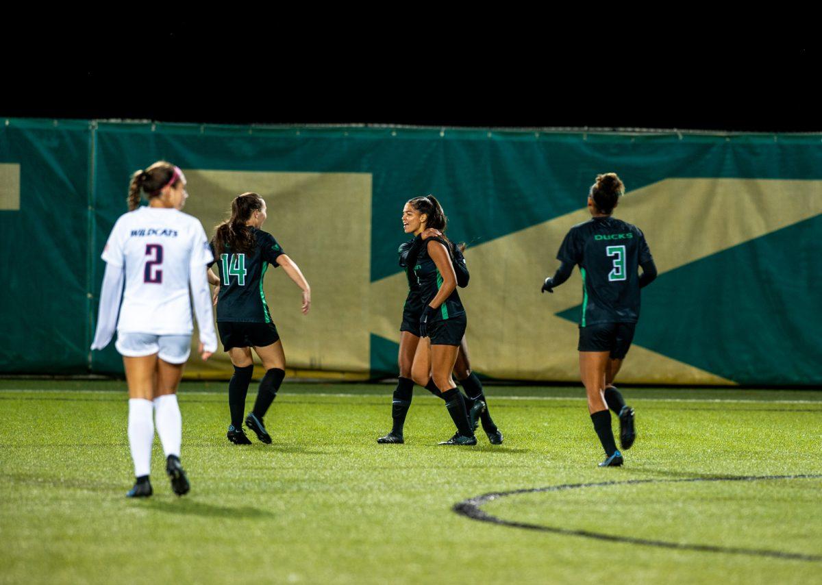 Chardonnay Curran (4, center) celebrates with her teammates after scoring the first and only goal of the game for Oregon. The University of Oregon Ducks defeated the Arizona Wildcats 1-0 on October 7, 2021. (Will Geschke/Emerald)