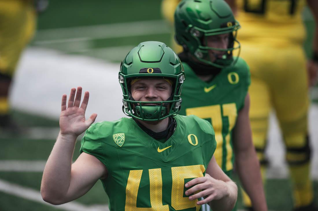 Ducks kicker Camden Lewis (49) stops to wave before half time commences. Oregon Ducks Football host annual Spring game at Autzen Stadium in Eugene, Ore., on May 1, 2021. (Maddie Stellingwerf)