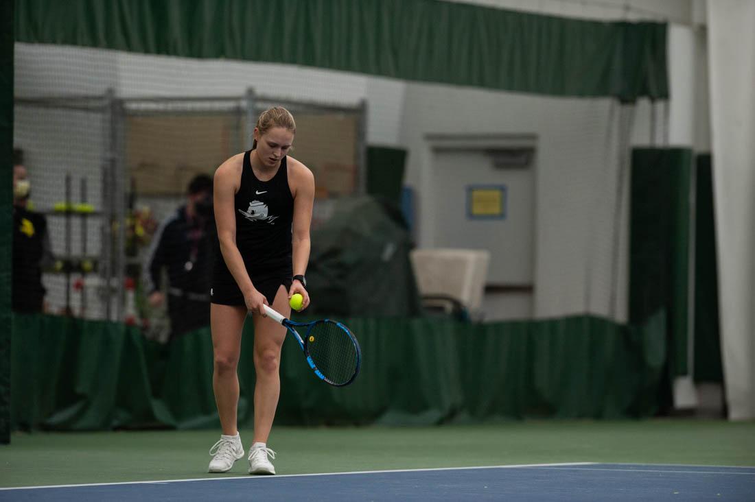 Duck freshman Sophie Luescher takes a breath before serving in her last set. UO Women&#8217;s Tennis takes on Portland State at the UO Student Tennis Center on Jan. 16th, 2022 (Mary Grosswendt/Emerald)