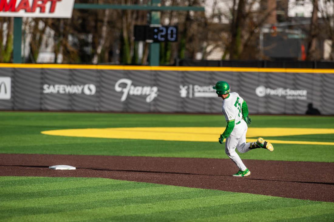 Anthony Hall (35) rounds second base while Ducks are at bat. Oregon Baseball takes on UC Santa Barbara Gauchos at PK Field in Eugene, Ore. on Mar. 4, 2022. (Mary Grosswendt/Emerald)