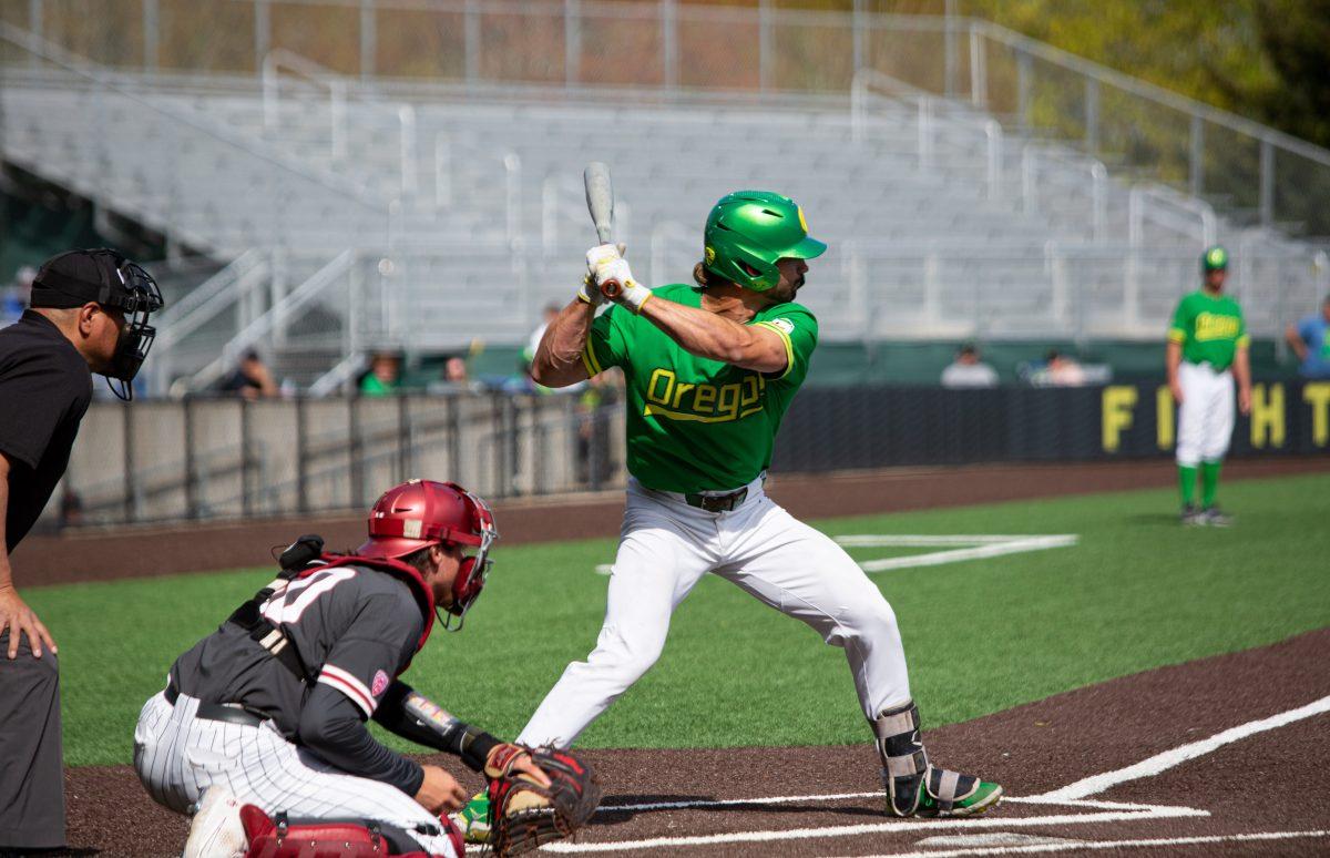 Tyler Ganus prepares to swing during his pinch hitting at bat. The Oregon Ducks Baseball team hosts Washington State at PK Park on April 24th, 2022. (Liam Sherry/Emerald)