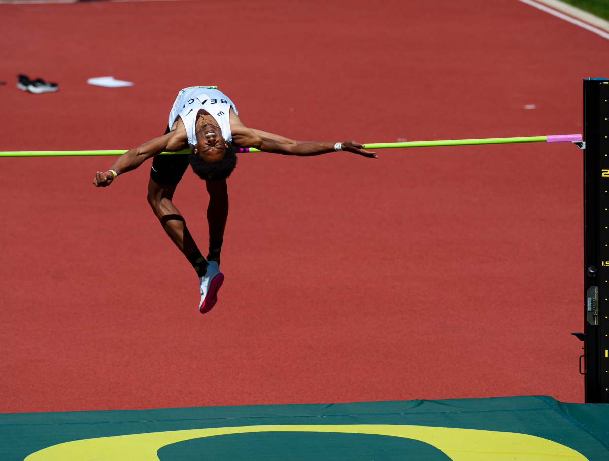 Jason Smith clears the bar over 2 meters. The second day of the Hayward Premiere track meet hosted at Hayward Field on April 2, 2021. (Liam Sherry/Emerald)