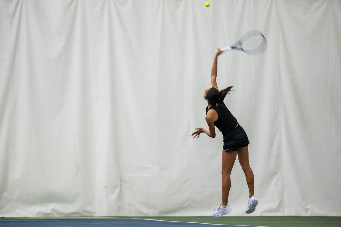 Duck sophomore Misaki Kobayashi jumps up to the ball to send it back over the net. UO Women&#8217;s Tennis takes on Portland State at the UO Student Tennis Center on Jan. 16th, 2022 (Mary Grosswendt/Emerald)