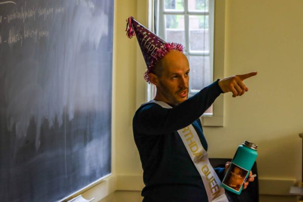 UO professor of English and Latinx studies Jose Cortez celebrates his birthday with his students in an English class. He believes introducing trigger warnings into a classroom will give the implication that it is a safe space. Instead, wants to create a “brave space” in his classroom to allow students to sometimes have uncomfortable conversations. Students and faculty at the University of Oregon share their thoughts on trigger warnings in the classroom and its impact on how content can be taught and learned. (Mary Grosswendt/Emerald)