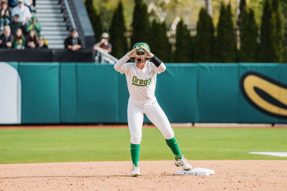 Paige Sinicki throws up a O and calls out to the Ducks dugout after hitting a base hit double. The Oregon Ducks Softball team faces the Oregon State Beavers, on May 1st, 2022, at Jane Sanders Stadium. (Serei Hendrie/Emerald)