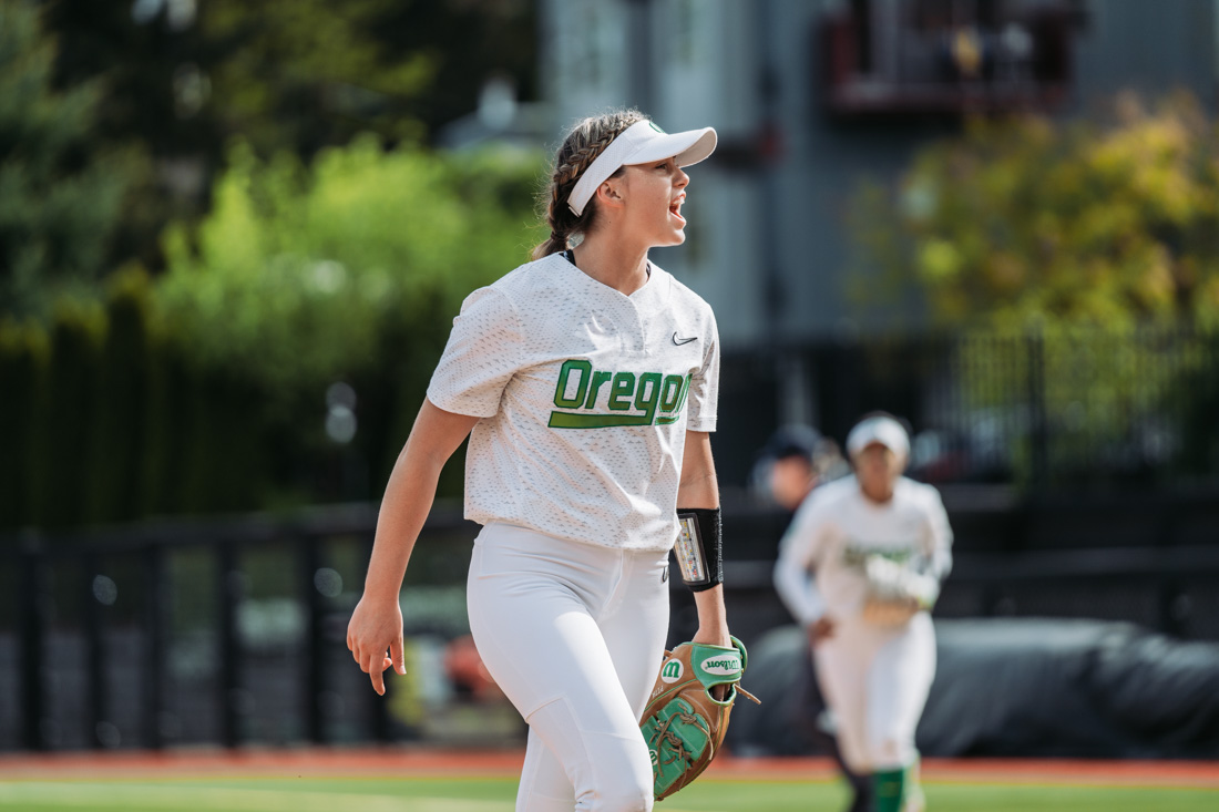 <p>Ducks pitcher Stevie Hansen cheers after striking out a batter. The Oregon Ducks softball team faces the Oregon State Beavers, on May 1, 2022, at Jane Sanders Stadium. (Serei Hendrie/Emerald)</p>