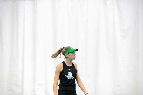 Karin Young takes a short break in between points. The Oregon Ducks face off against the Seattle U Redhawks on February 19th, 2022. (Liam Sherry/Emerald)