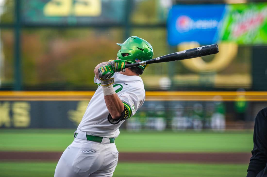 Brennan Milone (3) takes a swing while up at bat. Oregon Baseball takes on the Washington State Cougars at PK Field in Eugene, Ore. on April 22, 2022. (Mary Grosswendt/Emerald)