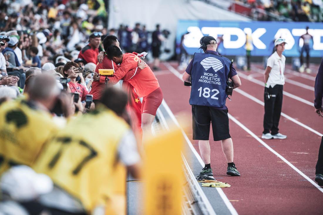 Mens long jump champion Wang Jianan rushes to the crowd for a hug after learning he won the event's final. An explosive first weekend of the World Athletic Championships comes to a close at Hayward field in Eugene, Ore., from July 15-17, 2022 (Maddie Stellingwerf/Emerald)