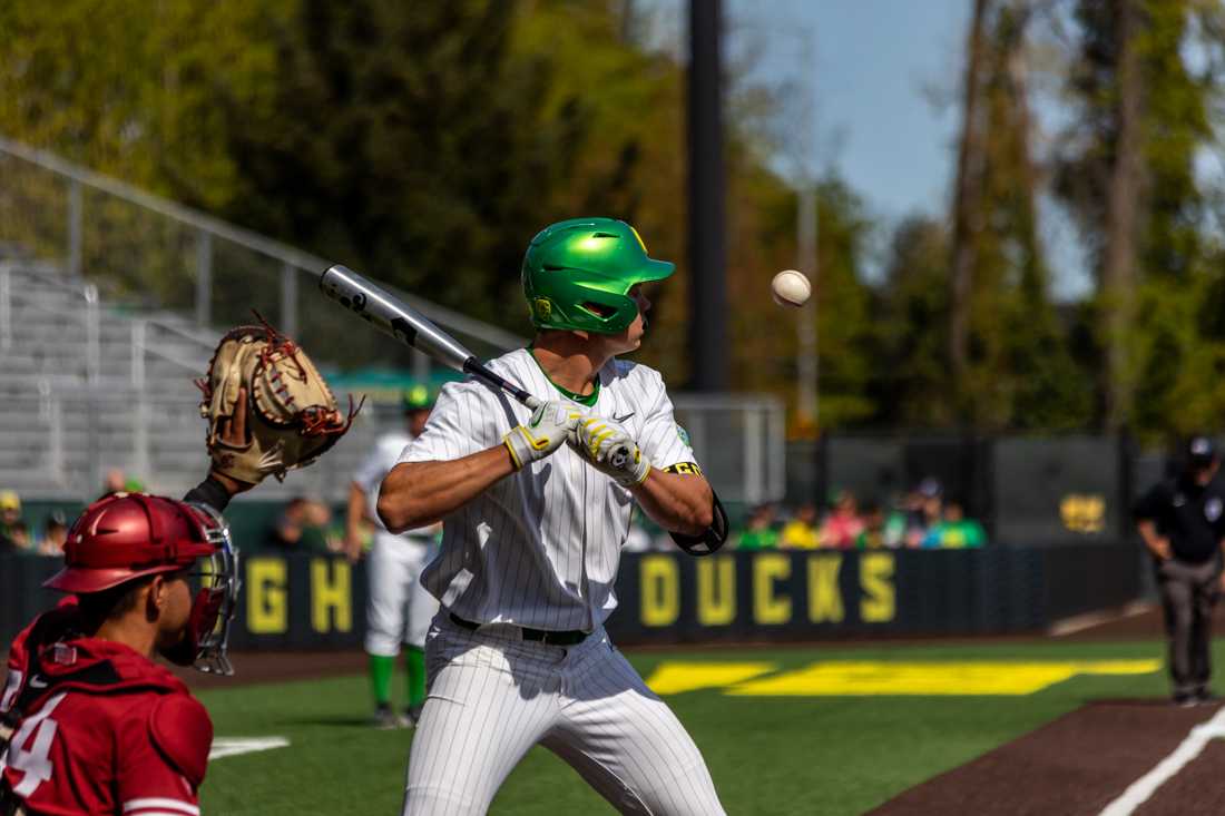 Josh Kasevich (04) watches a high ball go by. The Oregon Ducks Baseball team takes on Washington State on April 23th, 2022, at PK Park. (Molly McPherson/Emerald)