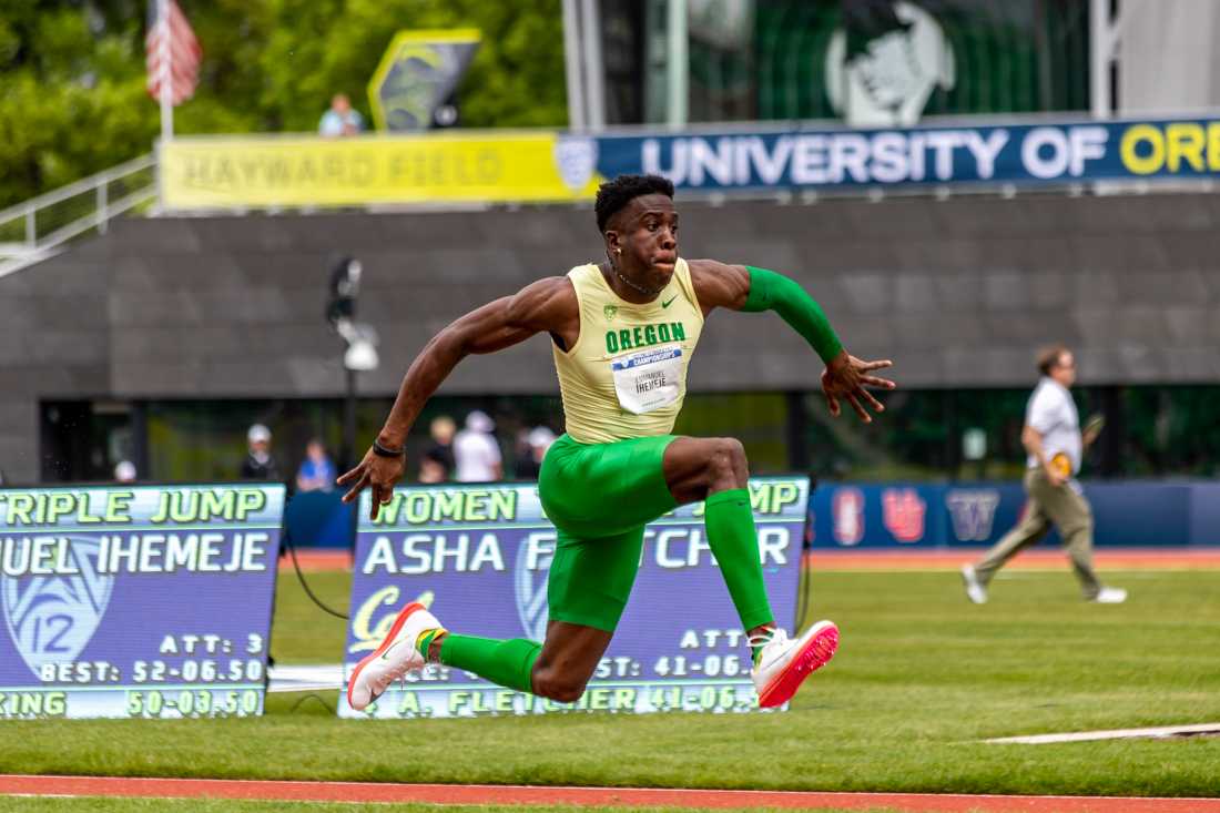 Emmanuel Ihemeje flies through the air during a triple jump attempt. The University of Oregon hosts the final day of the Pac-12 Track and Field Championships on May 15th, 2022 at Hayward Field. (Molly McPherson/Emerald)