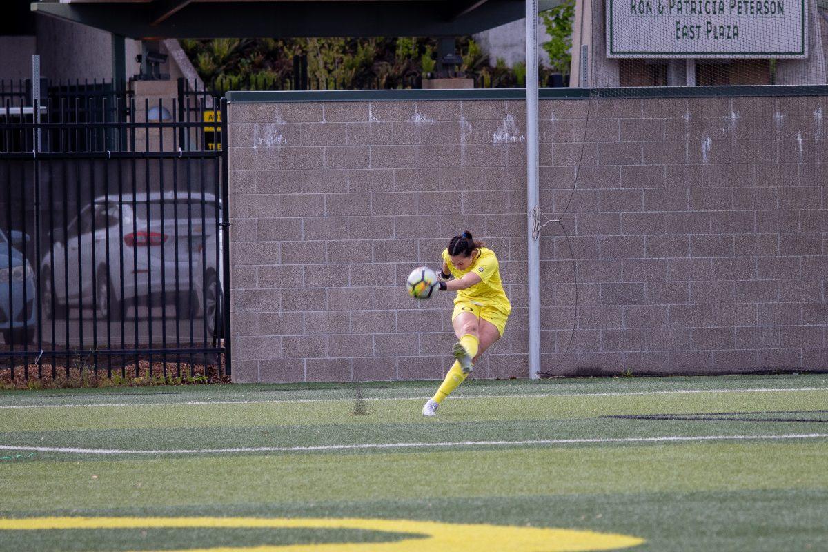 Leah Freeman (1) launches the ball downfield after the Ducks were given a goal kick.&#160;The Oregon Ducks Soccer Team Host Western Oregon at Pape Field on May 7, 2022. (Jonathan Suni, Emerald)