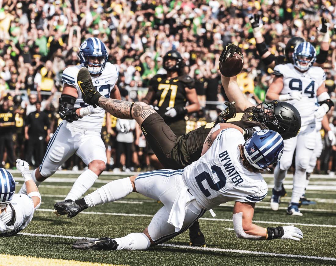 Ducks sophomore tight end Terrance Ferguson (3) battles Cougar defense for a touchdown in endzone territory. University of Oregon Ducks Football defeat the BYU Cougars in a home match at Autzen Stadium in Eugene, Ore., on Sep. 17, 2022. (Maddie Stellingwerf/Emerald)