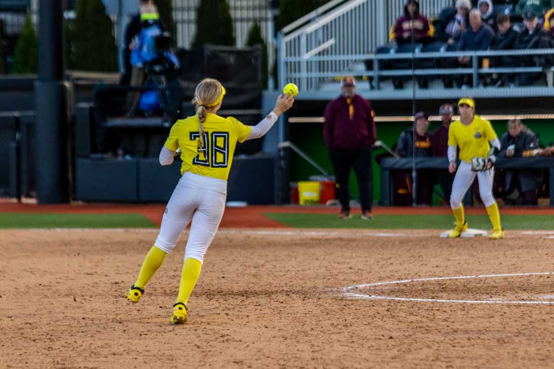 Paige Sinicki (38) throws the ball to first baseman KK Humphreys (13). Oregon Softball takes on Arizona State on April 8th, 2022, at Jane Sanders Stadium. (Molly McPherson/Emerald)