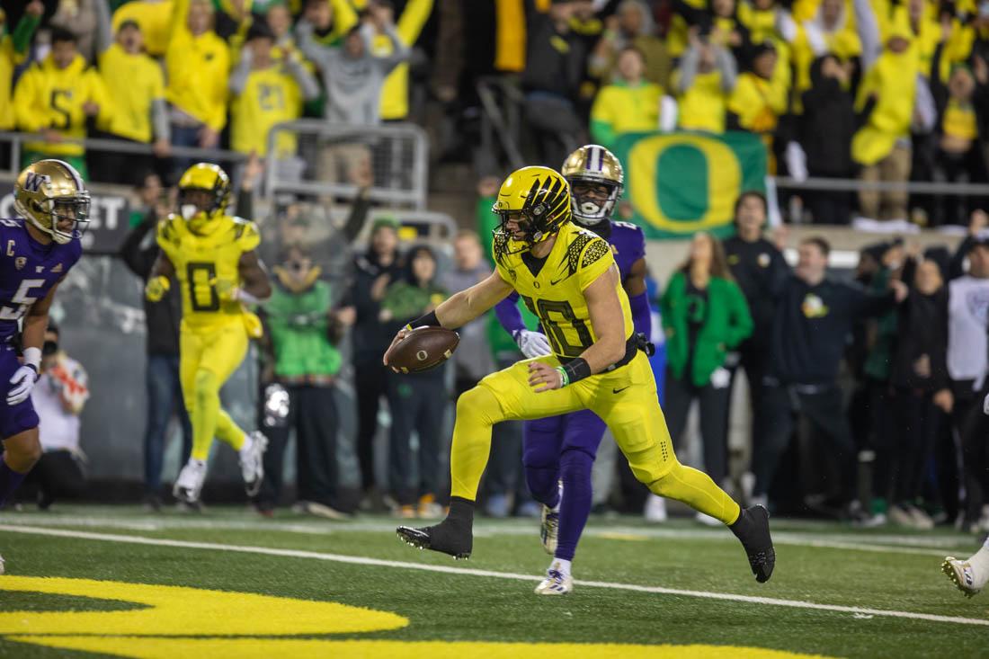 Ducks Quarterback Bo Nix (10) scores a rushing touchdown. The University of Oregon Ducks hosted the University of Washington Huskies at Autzen Stadium in Eugene, Ore., on November 12th, 2022 for game 10 of the 2022 season. (Kai Kanzer/Emerald)