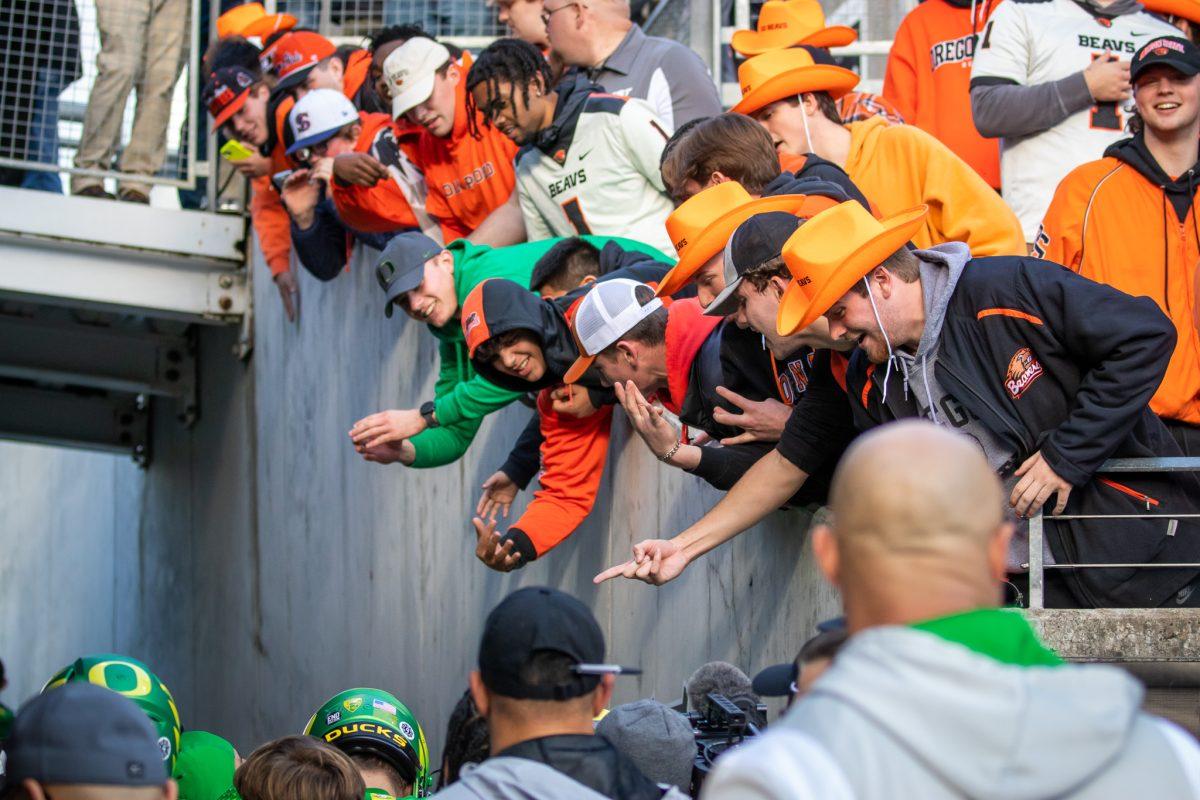 Oregon State fans yell at Duck players as they run to the visitors locker room for halftime.&#160;The Oregon Ducks travel up to Corvallis to face their in-state rival the Oregon State Beavers on November 26th, 2022, for their last game of the regular season.&#160;(Jonathan Suni, Emerald)