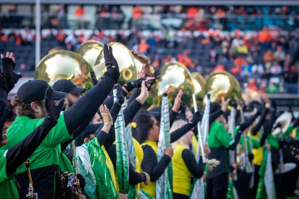 The Oregon Marching Band waves at the many Duck fans who traveled to Corvallis after playing the Duck's fight song.&#160;The Oregon Ducks travel up to Corvallis to face their in-state rival the Oregon State Beavers on November 26th, 2022, for their last game of the regular season.&#160;(Jonathan Suni, Emerald)