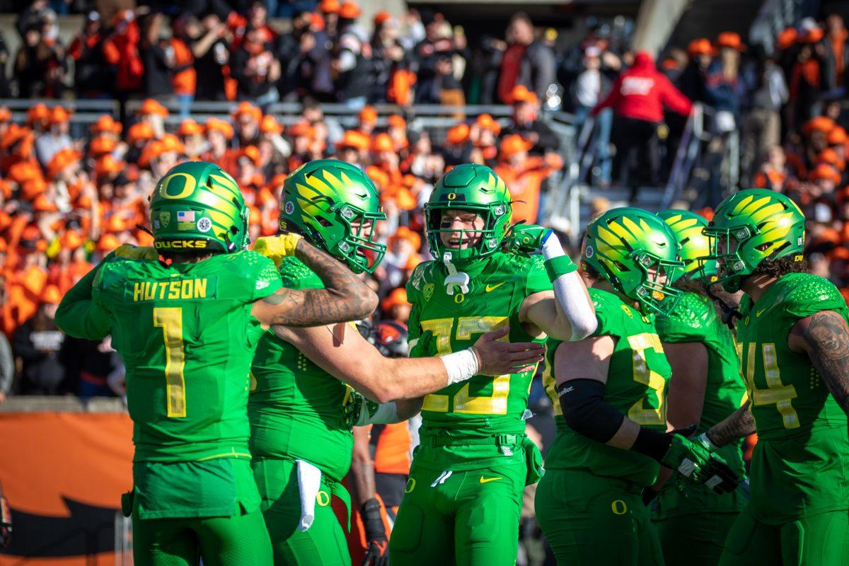 Chase Cota (23) celebrates with his team after a big opening touchdown for the Ducks.&#160;The Oregon Ducks travel up to Corvallis to face their in-state rival the Oregon State Beavers on November 26th, 2022, for their last game of the regular season.&#160;(Jonathan Suni, Emerald)